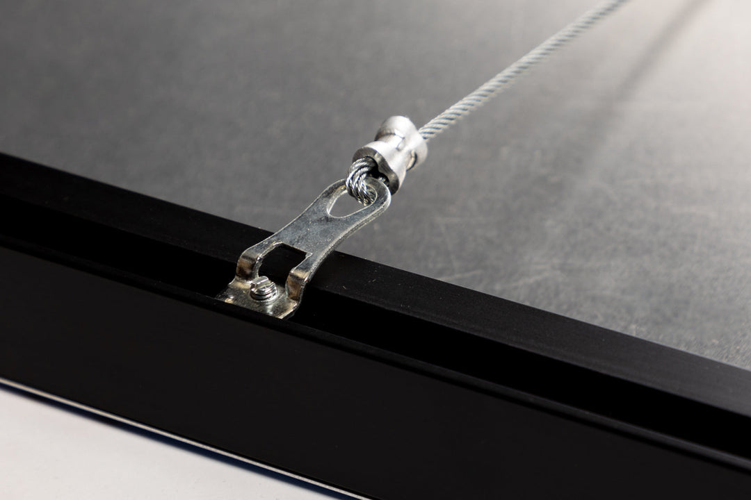 Wire hanging hardware on the frame back